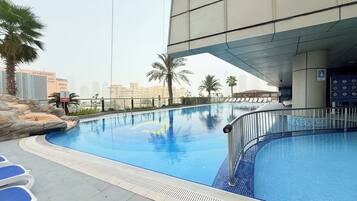 2 outdoor pools, pool umbrellas, pool loungers