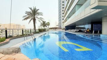 2 outdoor pools, pool umbrellas, pool loungers