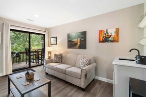 Condo, Multiple Beds, Balcony, Garden View (Top Notch) | Living area | 42-inch flat-screen TV with digital channels