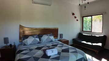 Deluxe Cabin, Pool View | In-room safe, blackout drapes, soundproofing, iron/ironing board