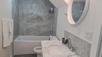 Hair dryer, towels, soap, toilet paper