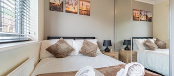 Luxury 3BR • Sleeps 8 • Parking