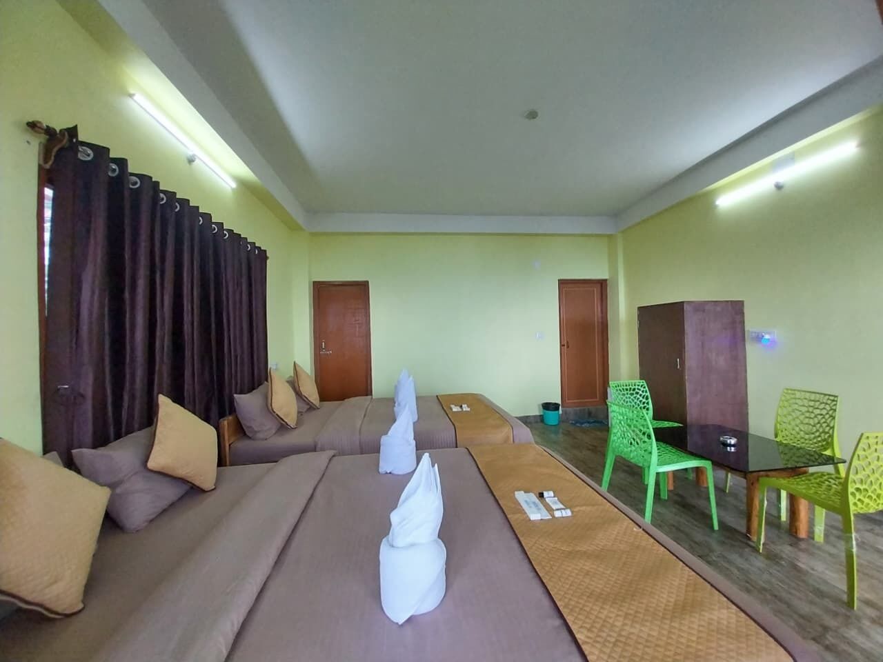 Family Room With Mountain View | Premium bedding, memory-foam beds, laptop workspace, soundproofing