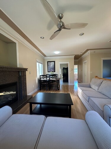 Bright West Side Retreat • 3BR • Kitchen & Living