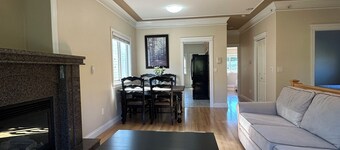 Bright West Side Retreat • 3BR • Kitchen & Living