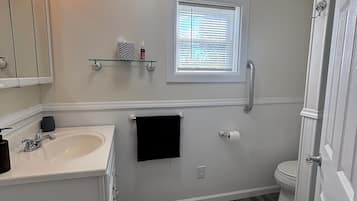 Shower, towels, soap, toilet paper