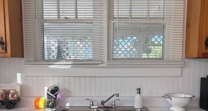 Welcome to Mini Meadows, a cozy two bedroom home in the country