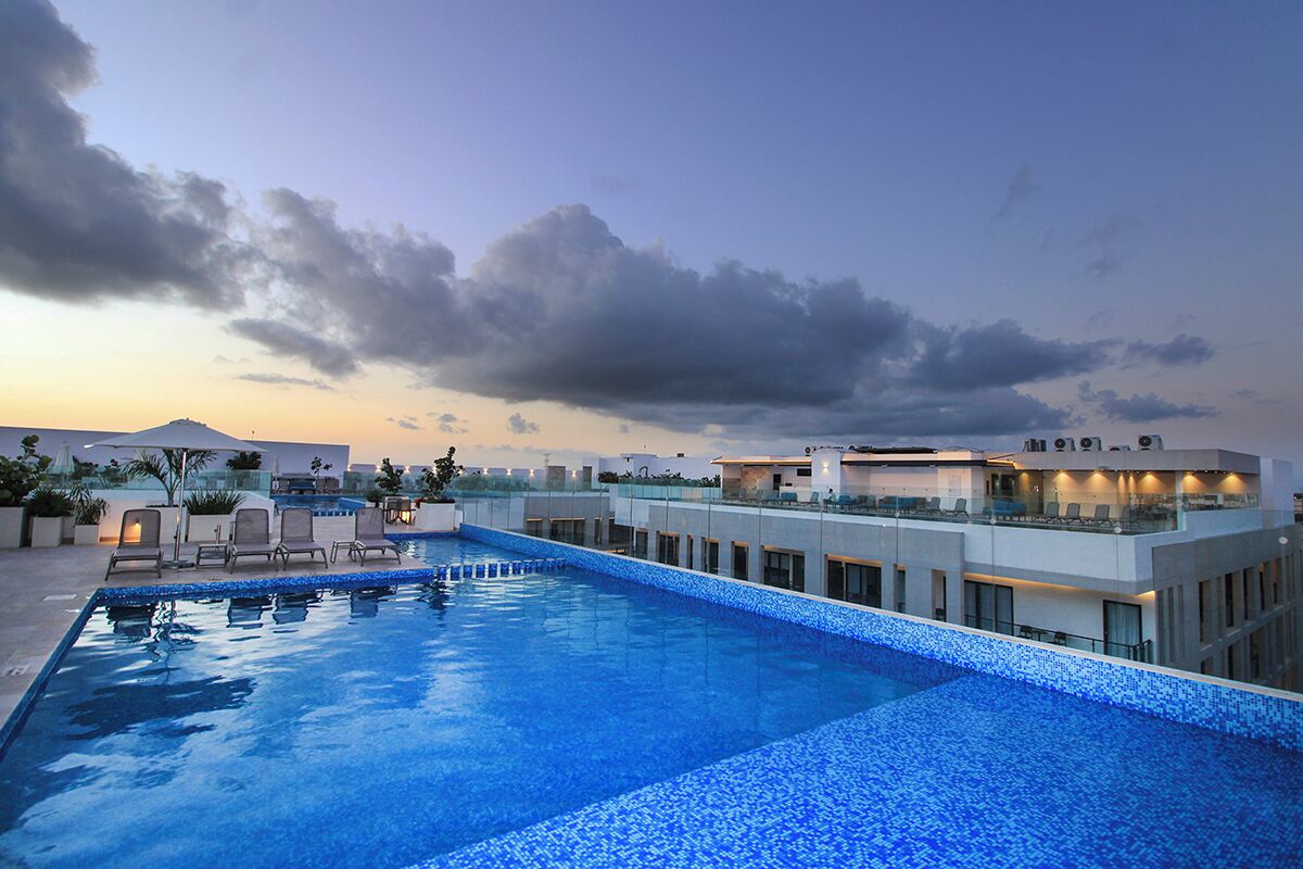 Outdoor pool, open 8:00 AM to 10:00 PM, pool umbrellas, sun loungers