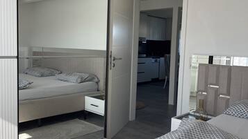 2 dormitorios, tabla de planchar con plancha, wifi y ropa de cama