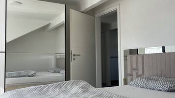 2 bedrooms, iron/ironing board, WiFi, bed sheets