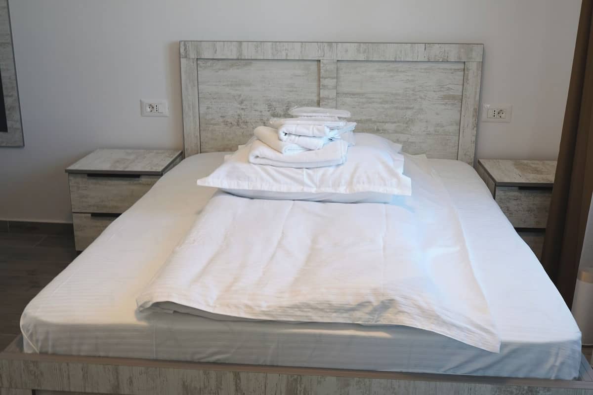 Economy Double Room, Balcony | Desk, laptop workspace, iron/ironing board, free WiFi