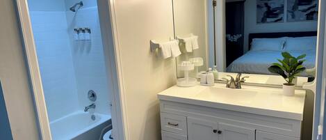 Hair dryer, towels, soap, toilet paper