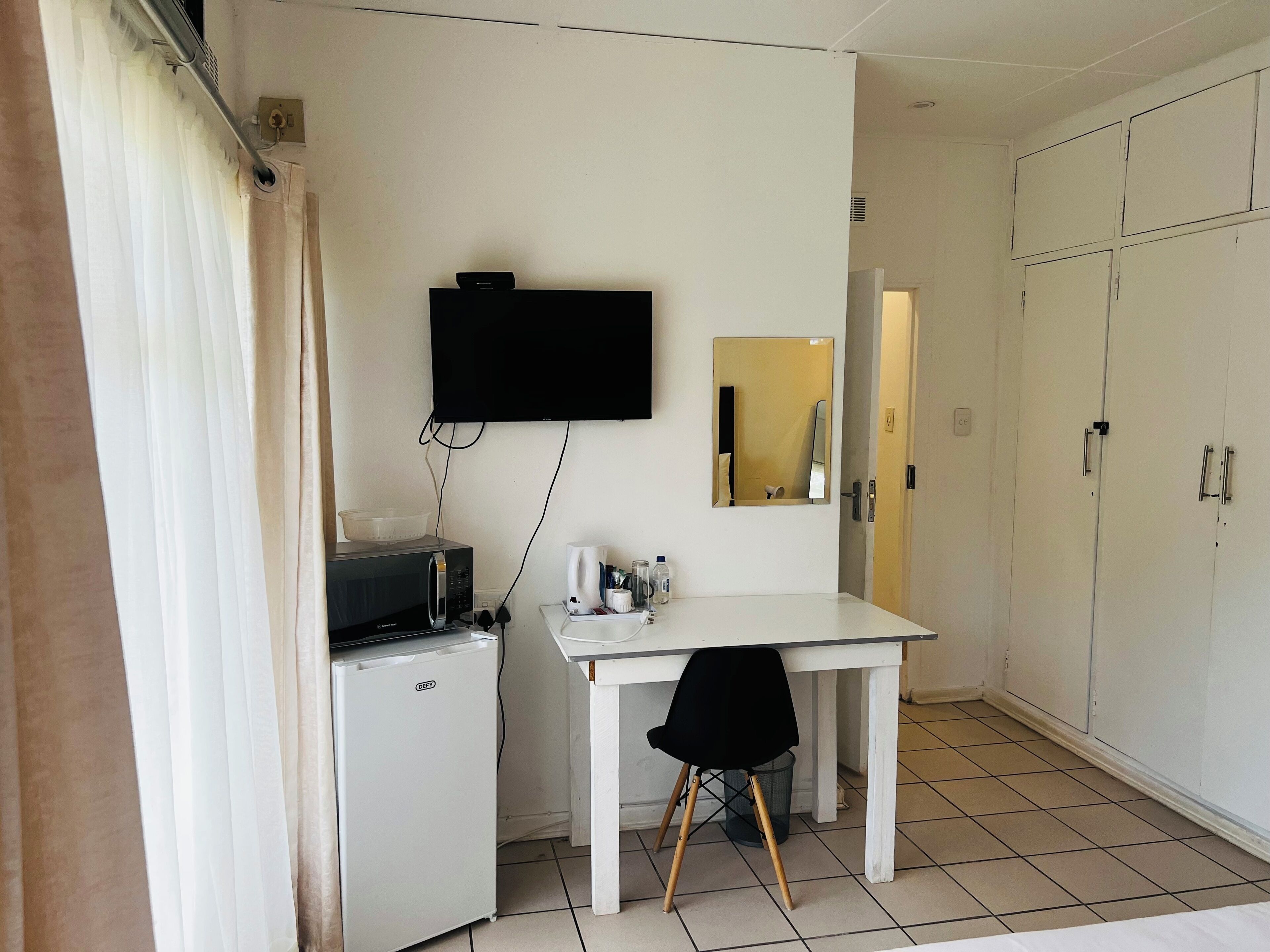 Superior Double Room, Balcony, Garden View | Desk, laptop workspace, blackout curtains, iron/ironing board