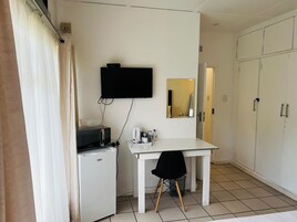 Superior Double Room, Balcony, Garden View | Desk, laptop workspace, blackout drapes, iron/ironing board