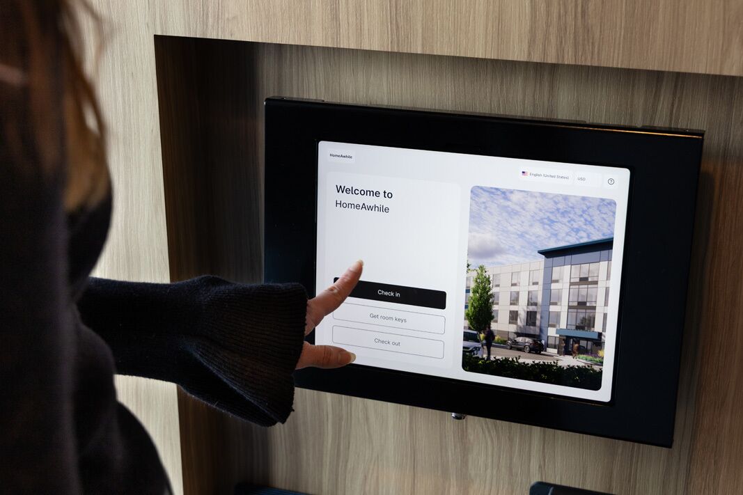 Check-in/check-out kiosk