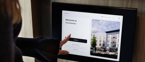 Check-in/check-out kiosk