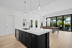 Microwave, oven, stovetop, dishwasher - Stunning 3-bedroom Pool home in Palm Beach Gardens at Avenir's L'Ambiance (Palm Beach Gardens)