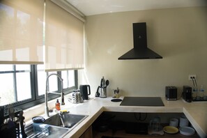 Microwave, stovetop, coffee/tea maker, electric kettle