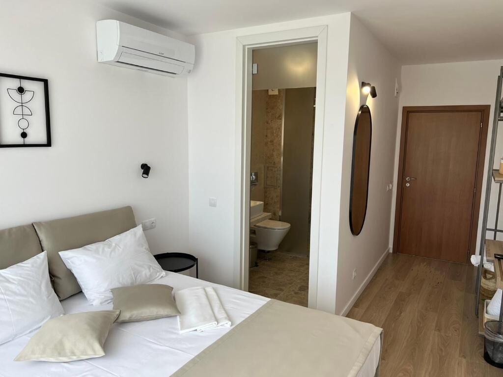 Deluxe Double Room, Balcony, Garden View | In-room safe, iron/ironing board, free WiFi