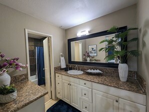 Hair dryer, towels, soap, shampoo