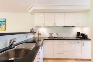 Oven, stovetop, dishwasher, coffee/tea maker
