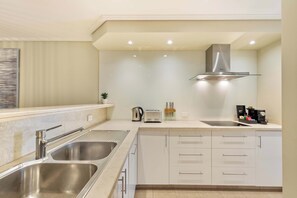 Oven, stovetop, dishwasher, coffee/tea maker