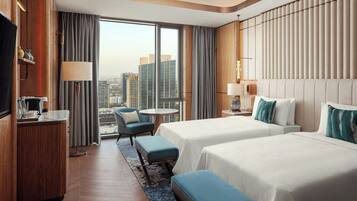 Premium bedding, down comforters, Tempur-Pedic beds, minibar