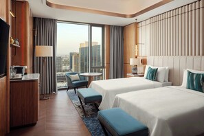 Premium bedding, down comforters, Tempur-Pedic beds, minibar