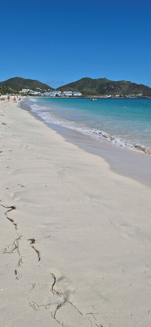 On the beach, sun loungers, beach towels