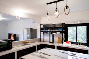 Departamento Deluxe, 4 habitaciones, vista a la ciudad | Cocina privada