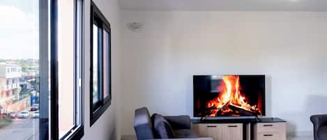 Deluxe Apartment, 4 Bedrooms, City View | Living area