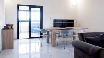 Deluxe Apartment, 4 Bedrooms, City View | Dining room