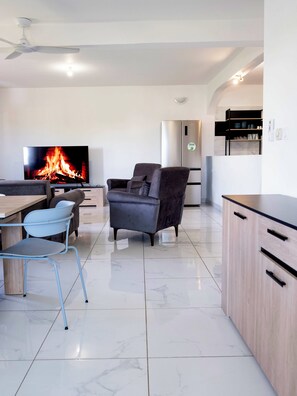 Deluxe Apartment, 4 Bedrooms, City View | Living area