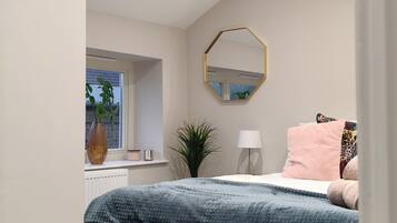 A bedroom with a bed, a window, a mirror, and a plant.