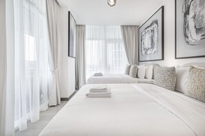 4 chambres, coffre-fort, fer et planche à repasser