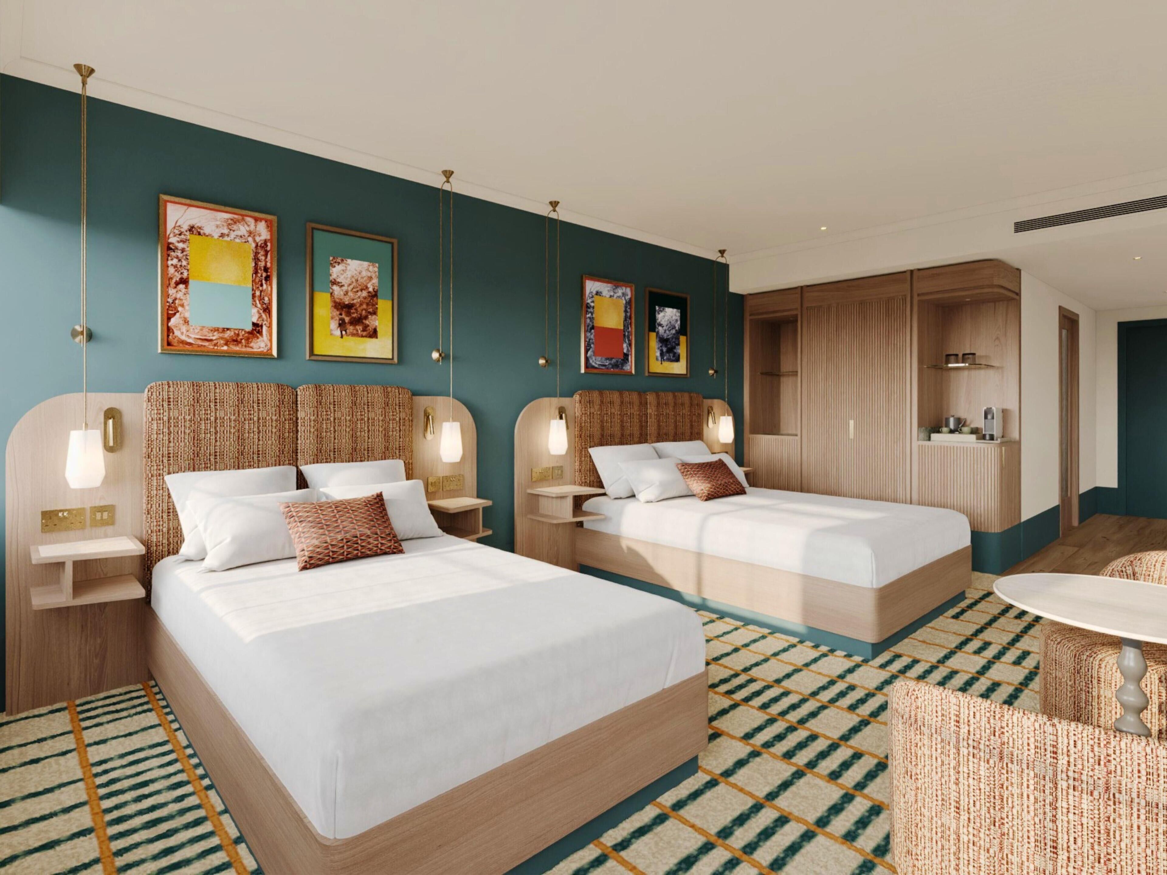 Deluxe Room, 2 Queen Beds | Free cribs/infant beds, free WiFi, bed sheets
