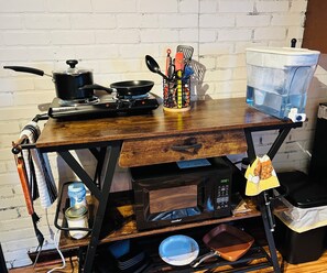 Fridge, microwave, stovetop, coffee/tea maker
