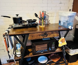 Fridge, microwave, stovetop, coffee/tea maker