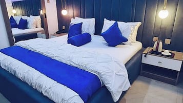 Economy Apartment, Balcony, City View | Desk, laptop workspace, blackout curtains, soundproofing