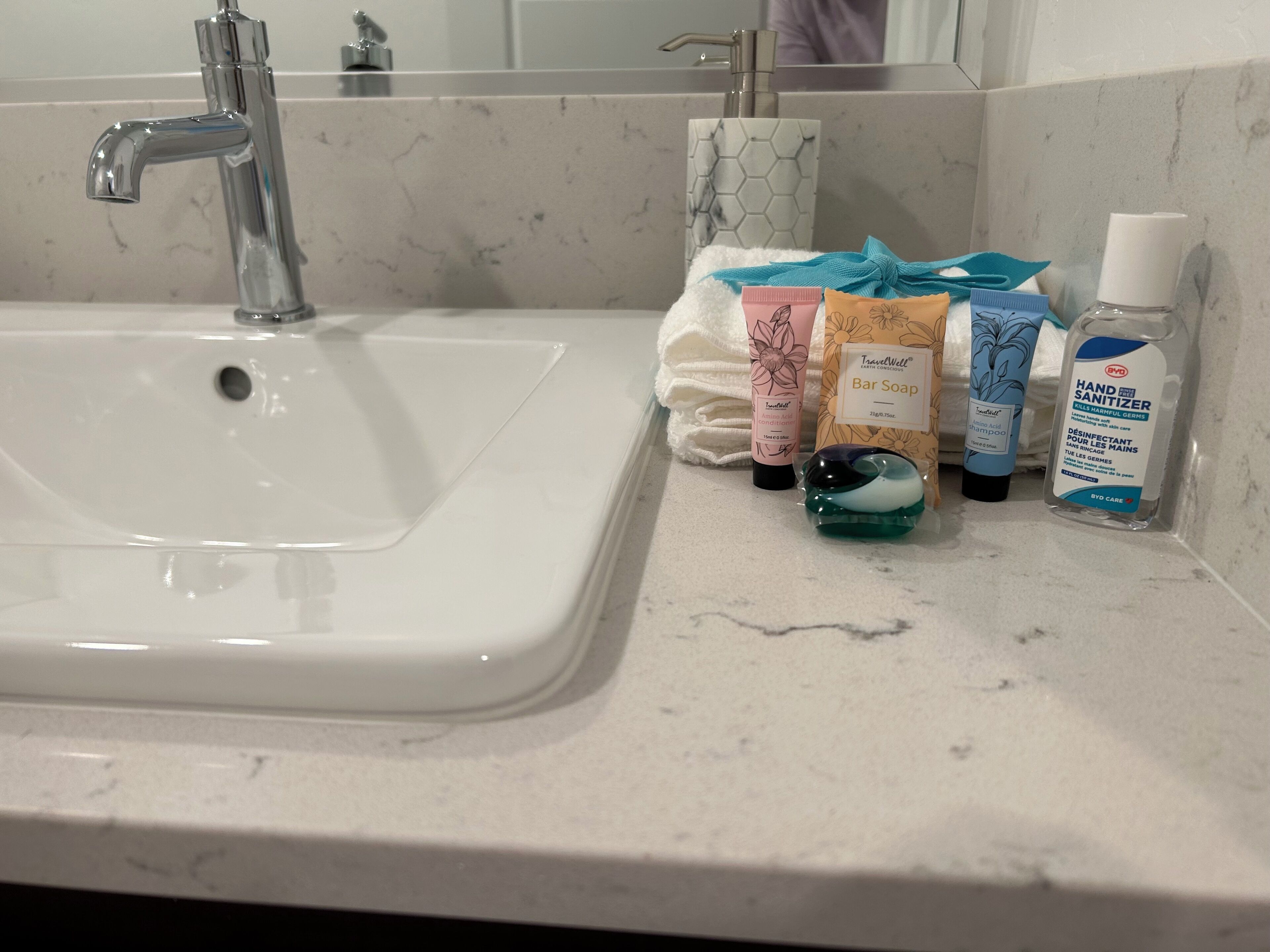 Hair dryer, towels, soap, toilet paper