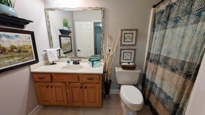 Jetted tub, hair dryer, towels, soap