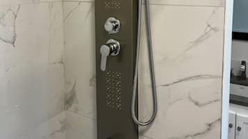 Shower, towels, soap, shampoo