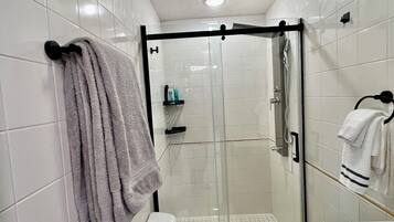 Shower, towels, soap, shampoo