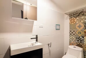 Hair dryer, towels, soap, toilet paper