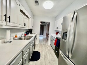 Private kitchen - 4BR w/ Pool • Furnished Extended Stay near Randolph AFB • Wi-Fi • W/D (Universal City)