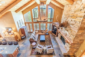 TV, fireplace - Skip the Ritz—Renovated Ski-In/Ski-Out Penthouse with Soaring 25-Ft Ceilings (Keystone)