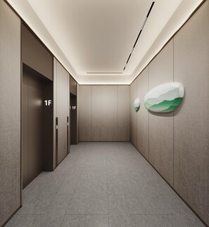 A modern elevator with a digital display showing '1F'. - Ji Hotel Guangzhou Huangpu Science City Luogang (Guangzhou)