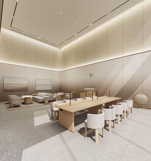 A modern conference room with a long table, multiple chairs, and a minimalist design. - Ji Hotel Guangzhou Huangpu Science City Luogang (Guangzhou)