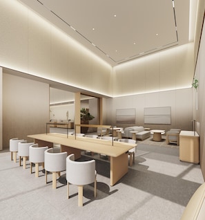 A modern hotel lobby with a long reception desk, seating area, and a large mirror. - Ji Hotel Guangzhou Huangpu Science City Luogang (Guangzhou)