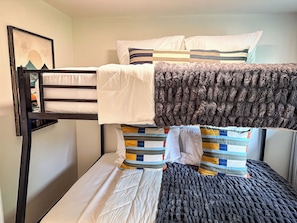 3 bedrooms, desk, iron/ironing board, travel cot